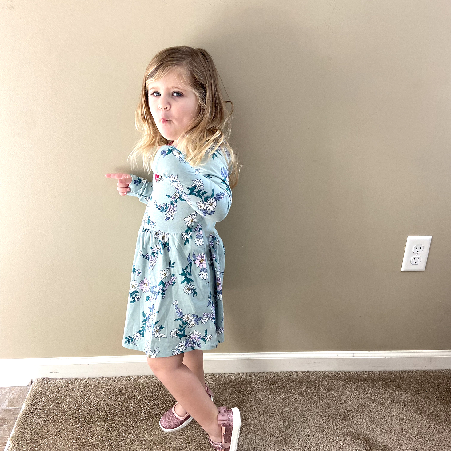 Christen's daughter showing off her latest dress and shoes from Stitch Fix.